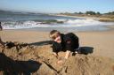 Kent digging in the sand