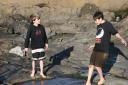 Kent and Jensen play in the tidepools