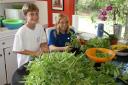 Kent and Alyssa with lots of Basil (for pesto)