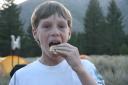 Kent eating his smore